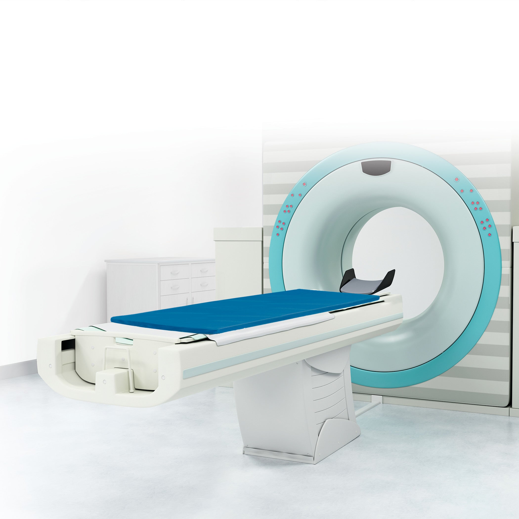An AliMed Support Surface for GE 1.5T/3T MRI Tables is shown on an MRI table, featuring a blue padded cover in a clinical setting.