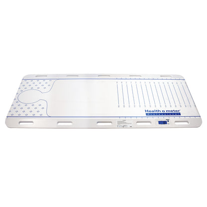 The Health o meter Patient Transfer Scale is a flat, rectangular device with measurements, used for weighing patients during transfers.
