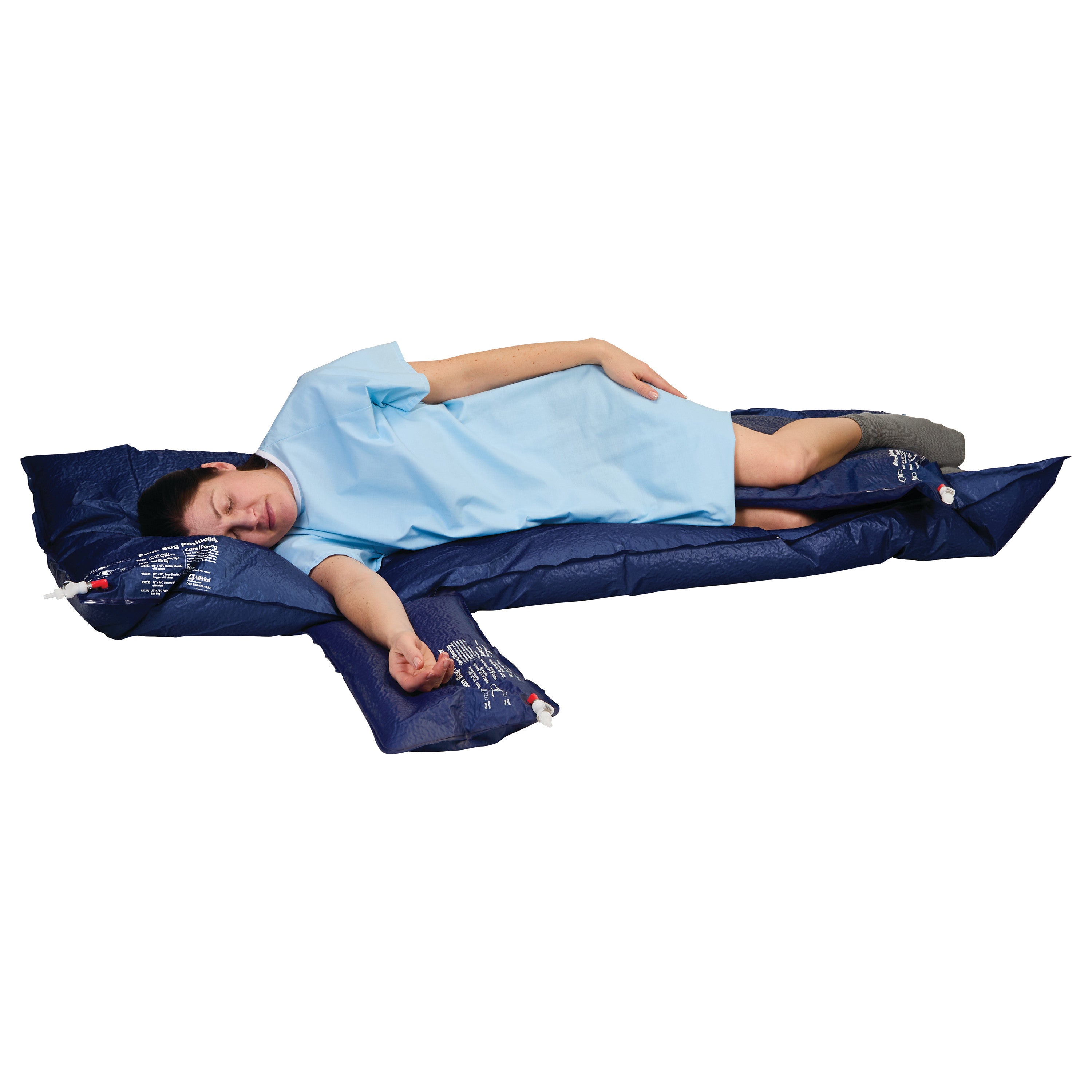 A person is lying on the AliMed Universal Bean Bag Positioner, wearing a blue gown. The blue positioner supports their body.