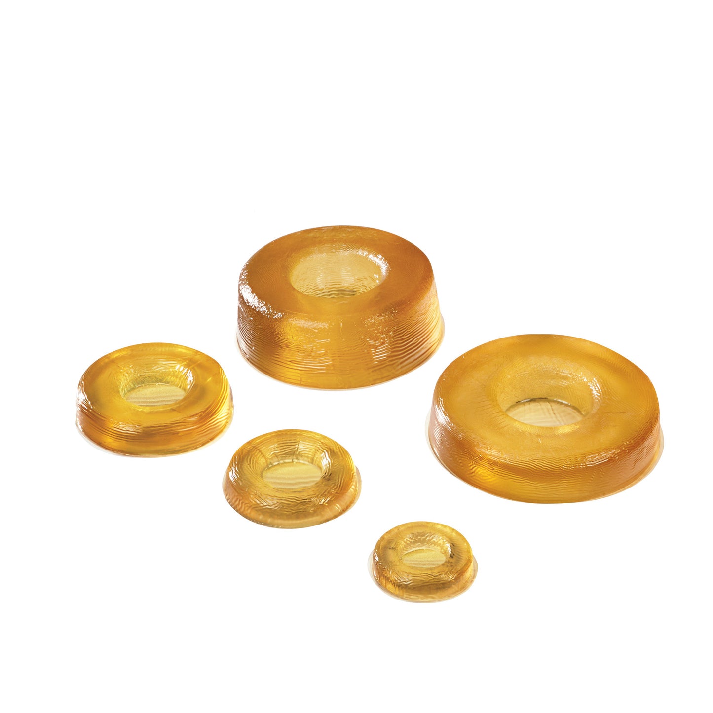 AliMed AliGel Head Donuts in varying sizes, made of translucent amber gel with a circular shape and a central hole.