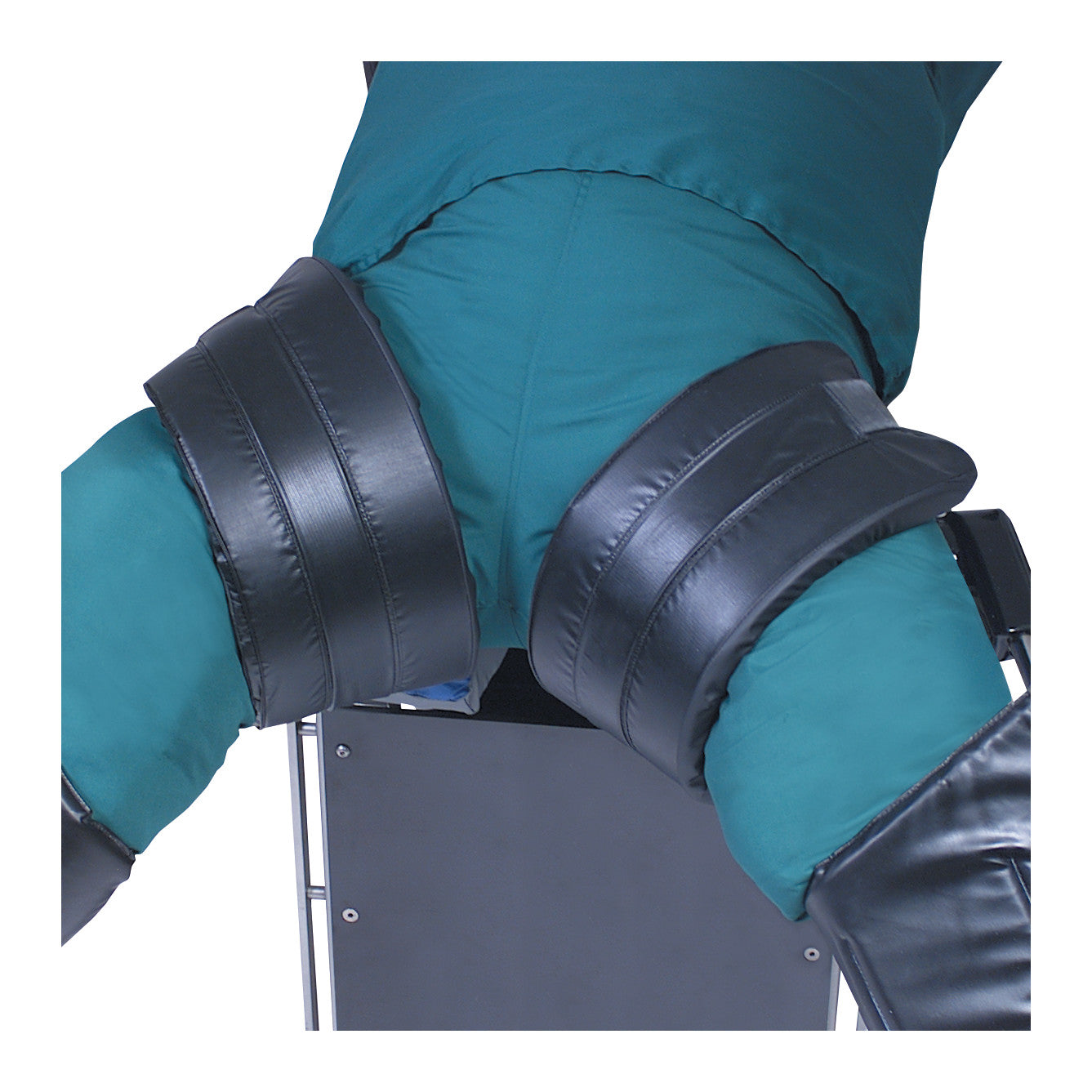 A pair of green padded legs with black straps are restrained in a device, known as the Allen Bariatric Nissen Strap.