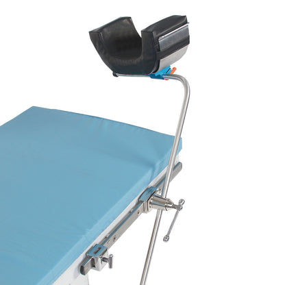 AliMed Bariatric Universal Positioner attached to a medical table with blue padding and an adjustable arm for support.