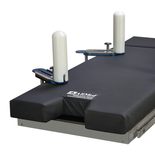 AliMed Posterior Lateral Positioner with two vertical white supports on a black padded surface, designed for medical positioning.