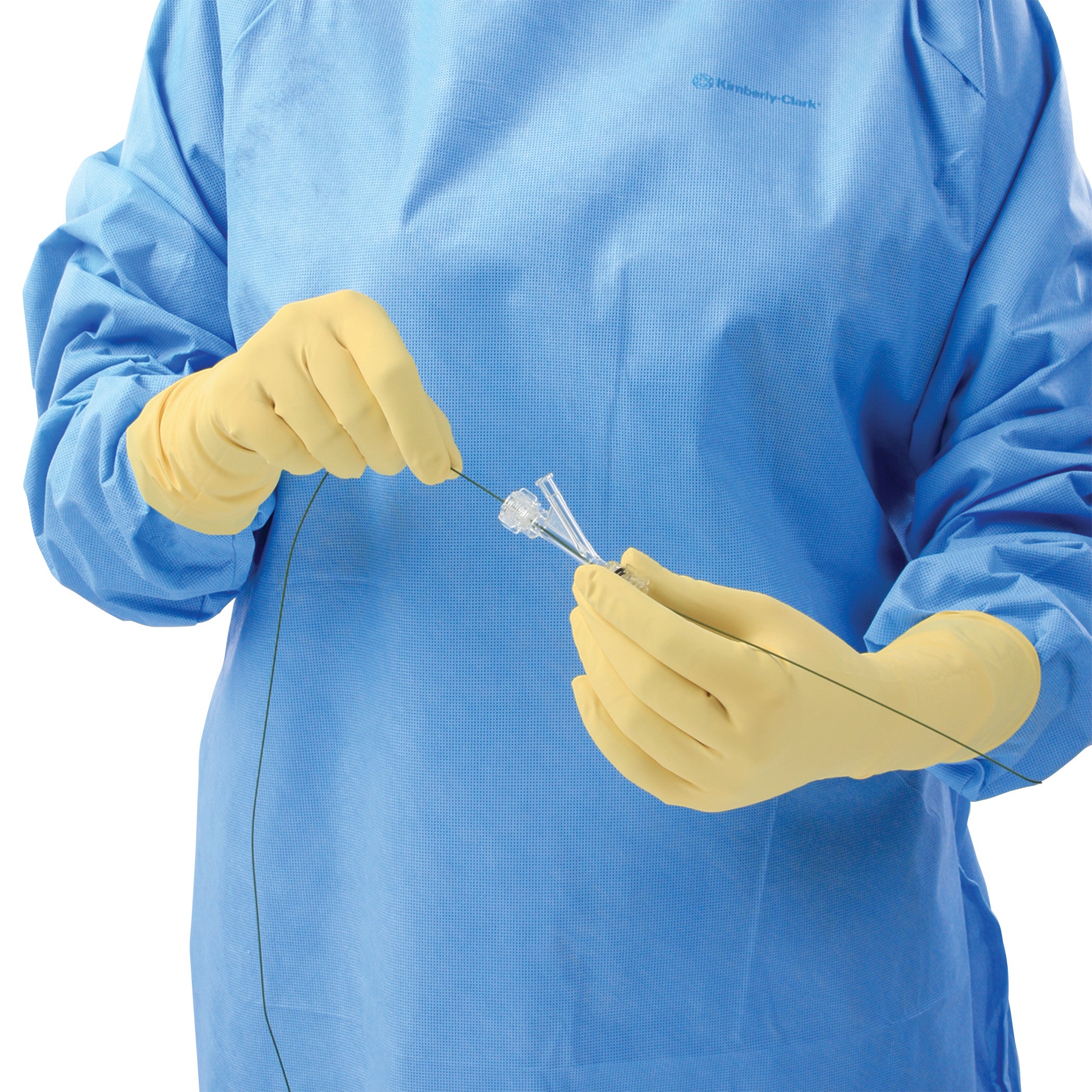Person wearing AliMed Original Radiation Attenuation Gloves in yellow, manipulating a medical instrument, dressed in a blue gown.