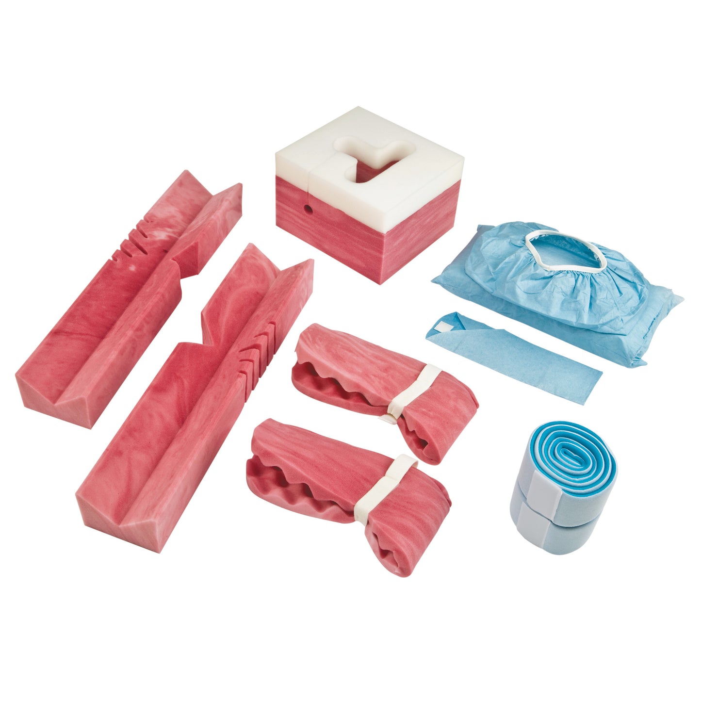 The Andrews Table Foam Positioner Kit includes foam pads, a headrest, straps, and a blue disposable cover for medical positioning.