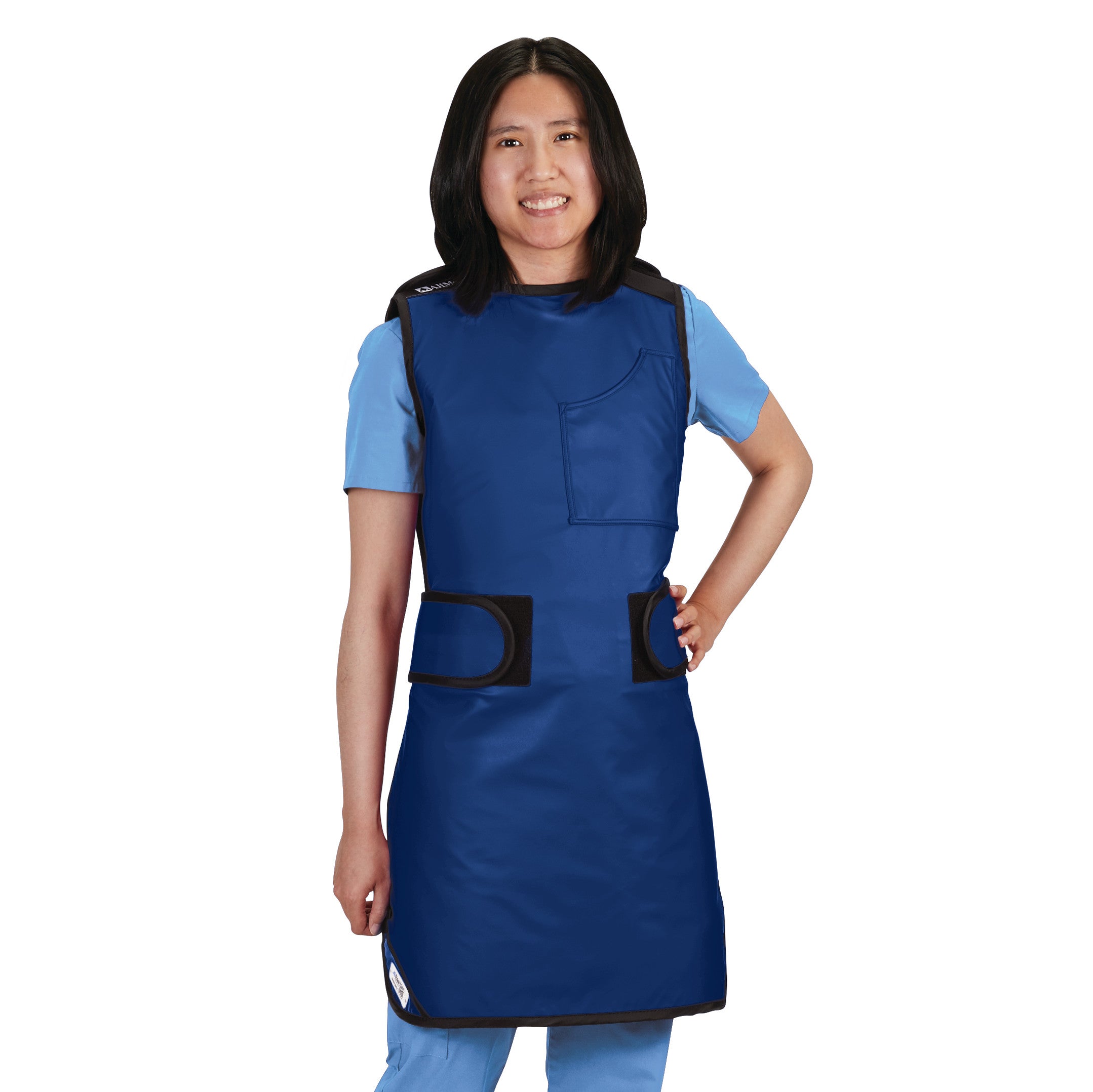 A person wears an AliMed Grab n Go 4-Point Quick Drop, Female, a blue, sleeveless protective apron with black straps.