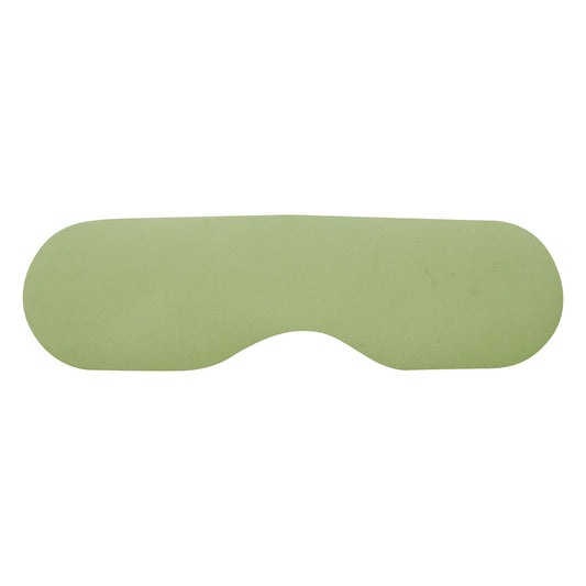 SecureShield CT Eye Shield, green, rectangular with oval ends, designed for patient eye protection during medical imaging procedures.