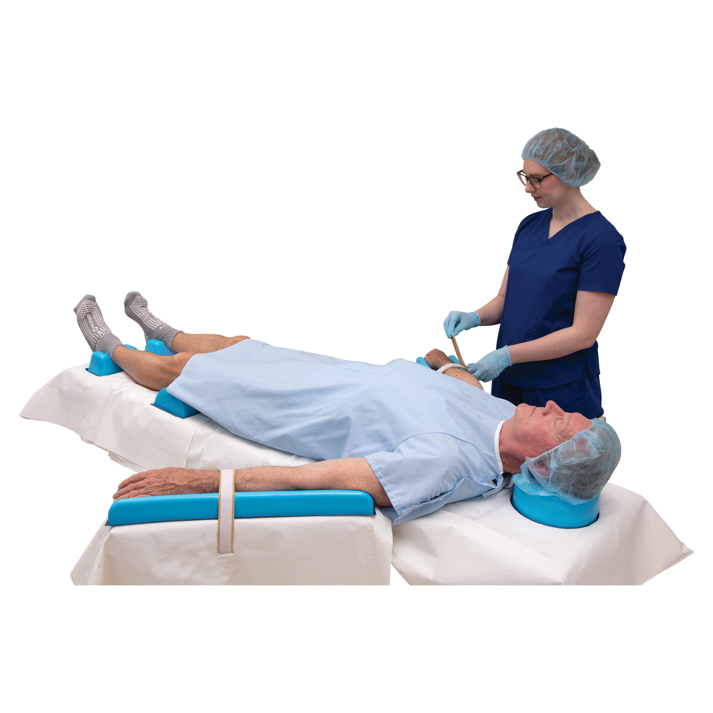 A healthcare worker adjusts a patient's arm on an AliMed AliBlue Lite Hybrid Gel Contoured Armboard Pad in a medical setting.