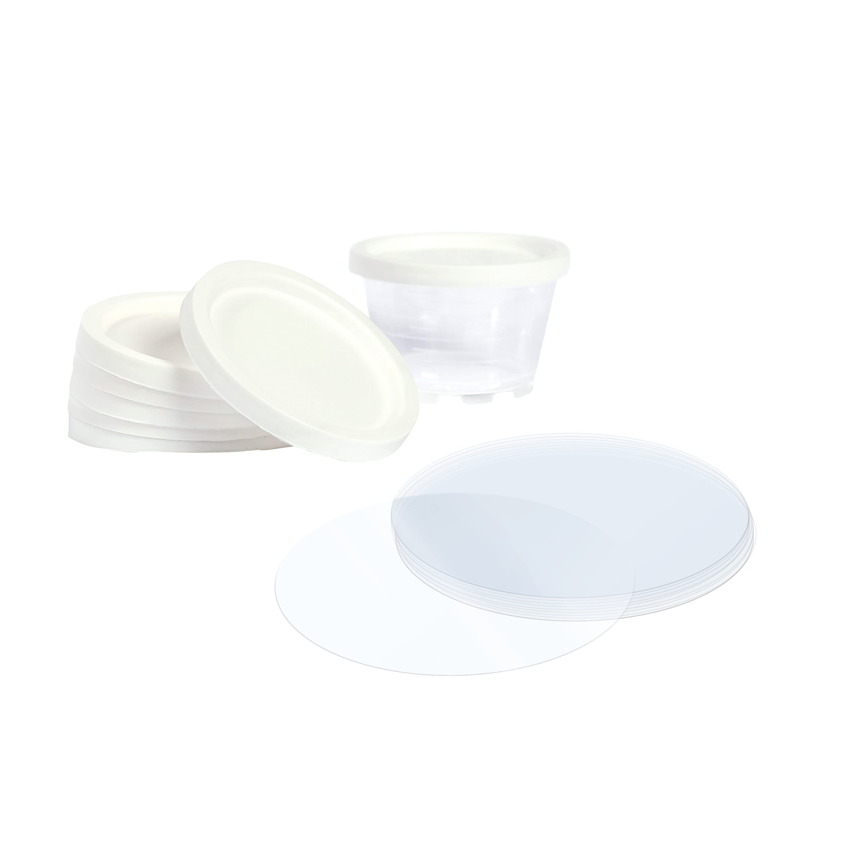 Components of the Severo Electric Pill Grinder, including a stack of white lids, a clear container, and circular discs.