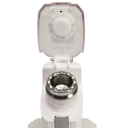 A Severo Electric Pill Grinder with its lid open, revealing the inner grinding chamber.