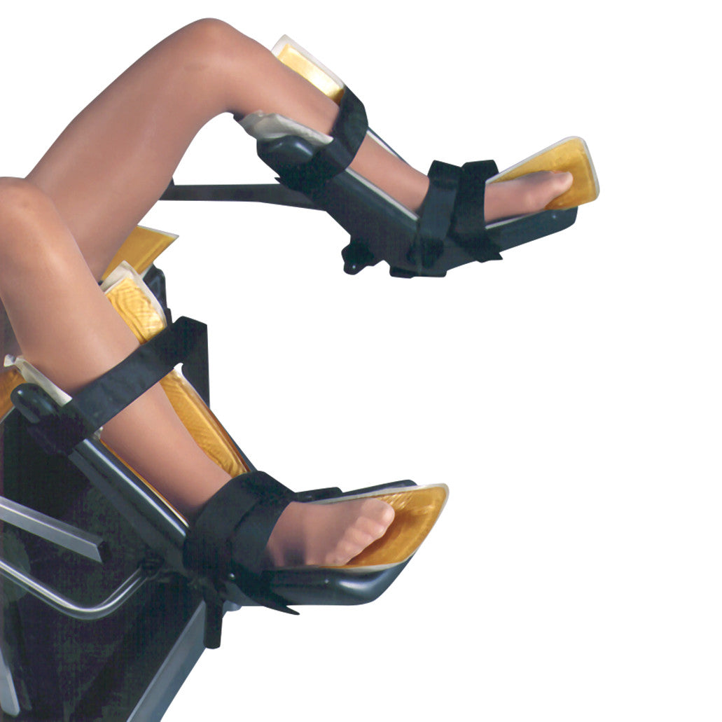 Person's legs are secured in AliMed AliGel Lithotomy Boot Stirrup Pads for SAM Stirrups, designed for surgical use.