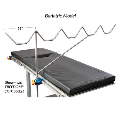 The AliMed Bariatric Picket Fence Leg Prepper features a zigzag metal support and an 11-inch clearance over a padded surgical table.