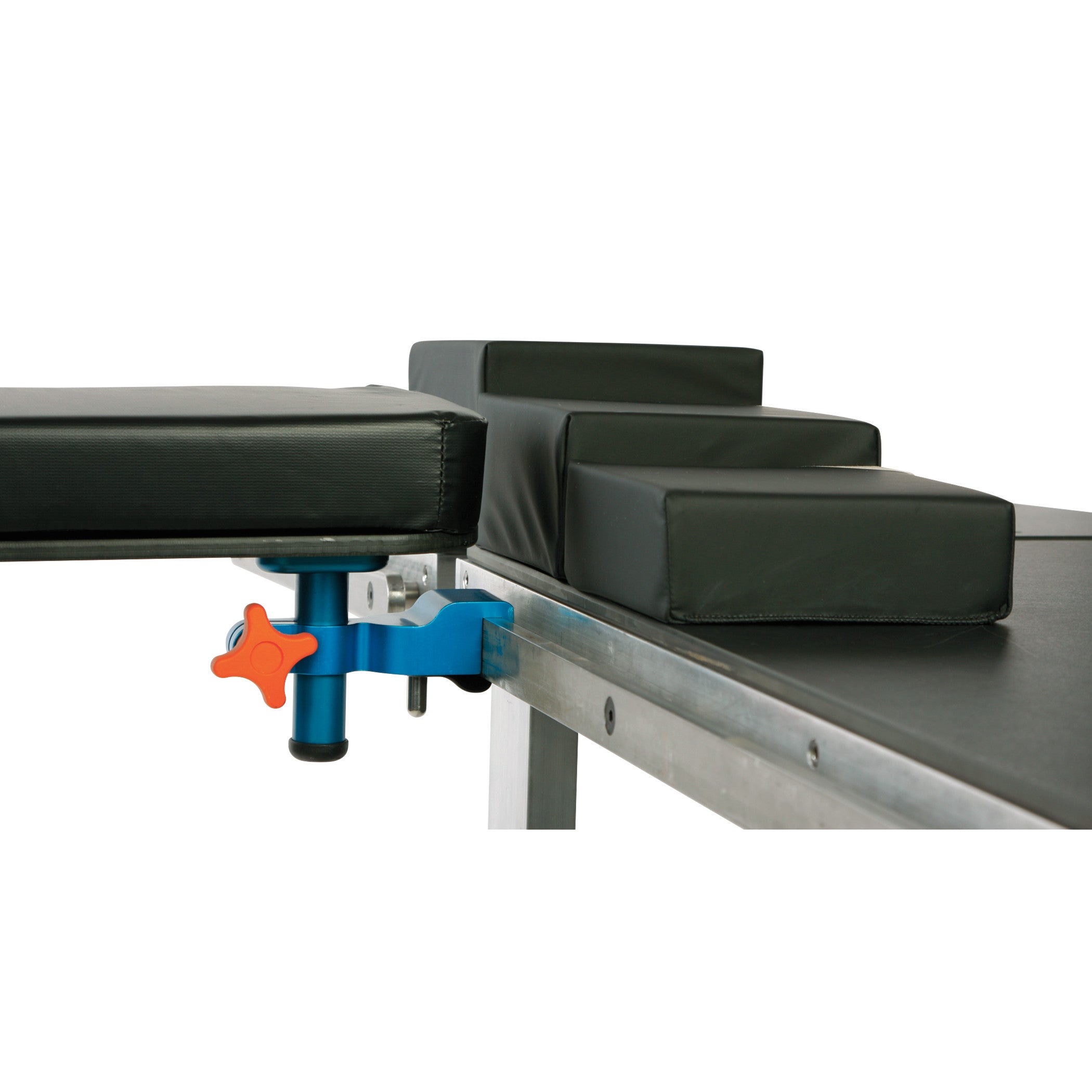 AliMed Height-Adjustable Rhino Board Armboard attached to a padded medical table with blue and orange adjustment mechanism.