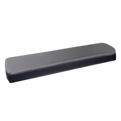 KYRA Table Width Extender, a black padded cushion designed to increase the width of a medical table for enhanced patient comfort.