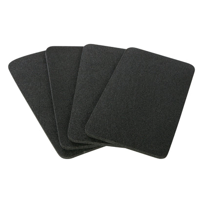 Four black rectangular pads are shown. They are PAD FOOT ADHESIVE DISP FOR TKR FOOTREST 12/PK.