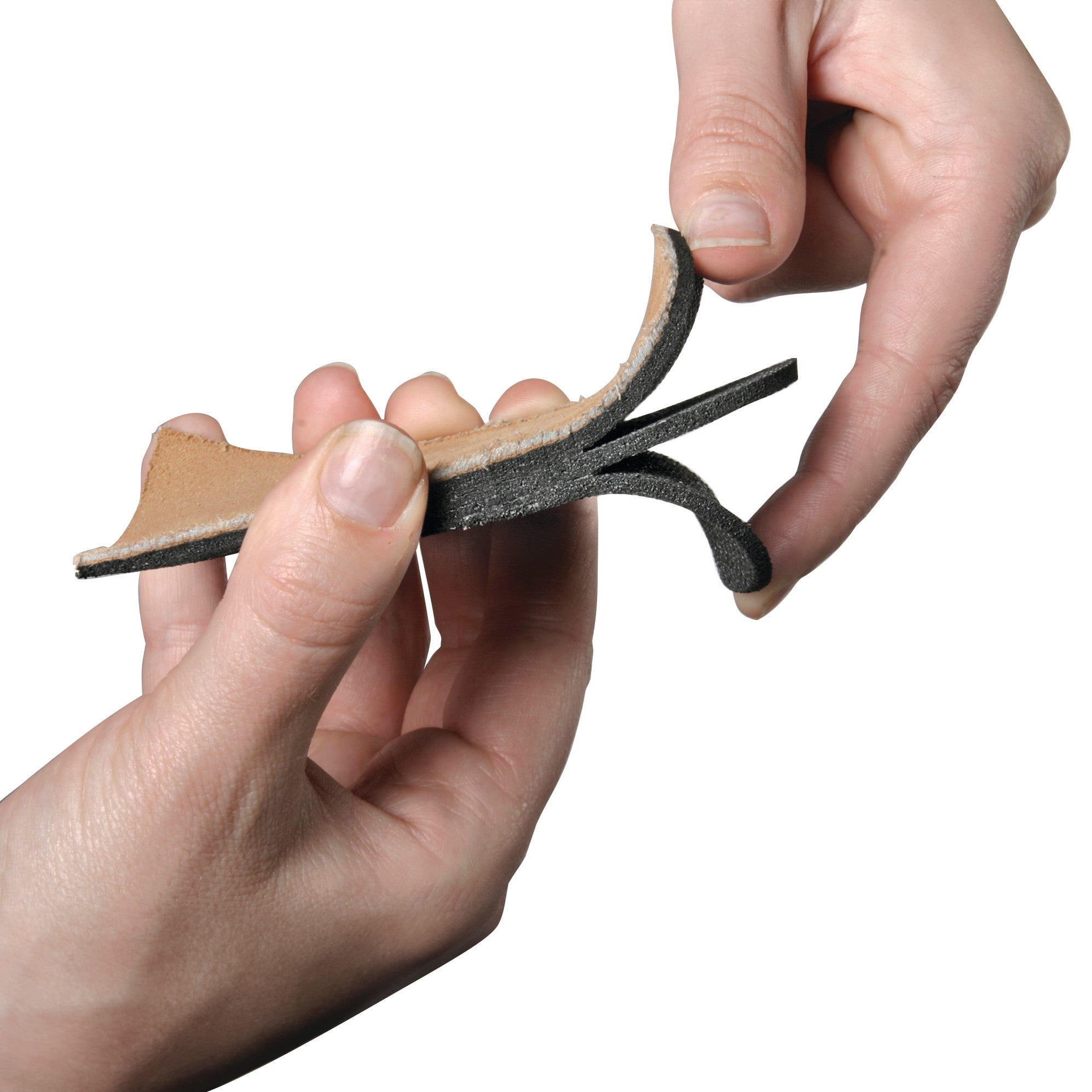 Hands hold an AliMed Adjustable Heel Lift, showing its flexible design and layers, against a white background.