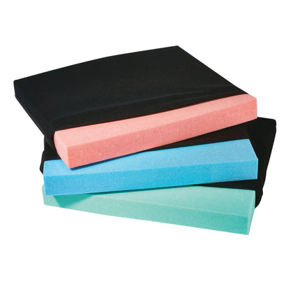 Three AliMed T-Foam Uncovered Wheelchair Cushions, in pink, blue, and green foam, are shown with black covers.