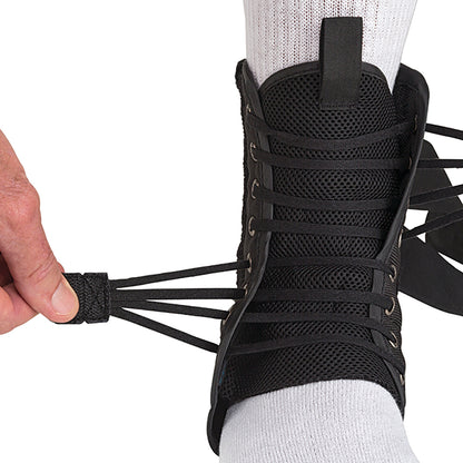 A person tightens an �ssur Formfit Ankle Brace with Speedlace over a white sock, showcasing its lace-up design for support.