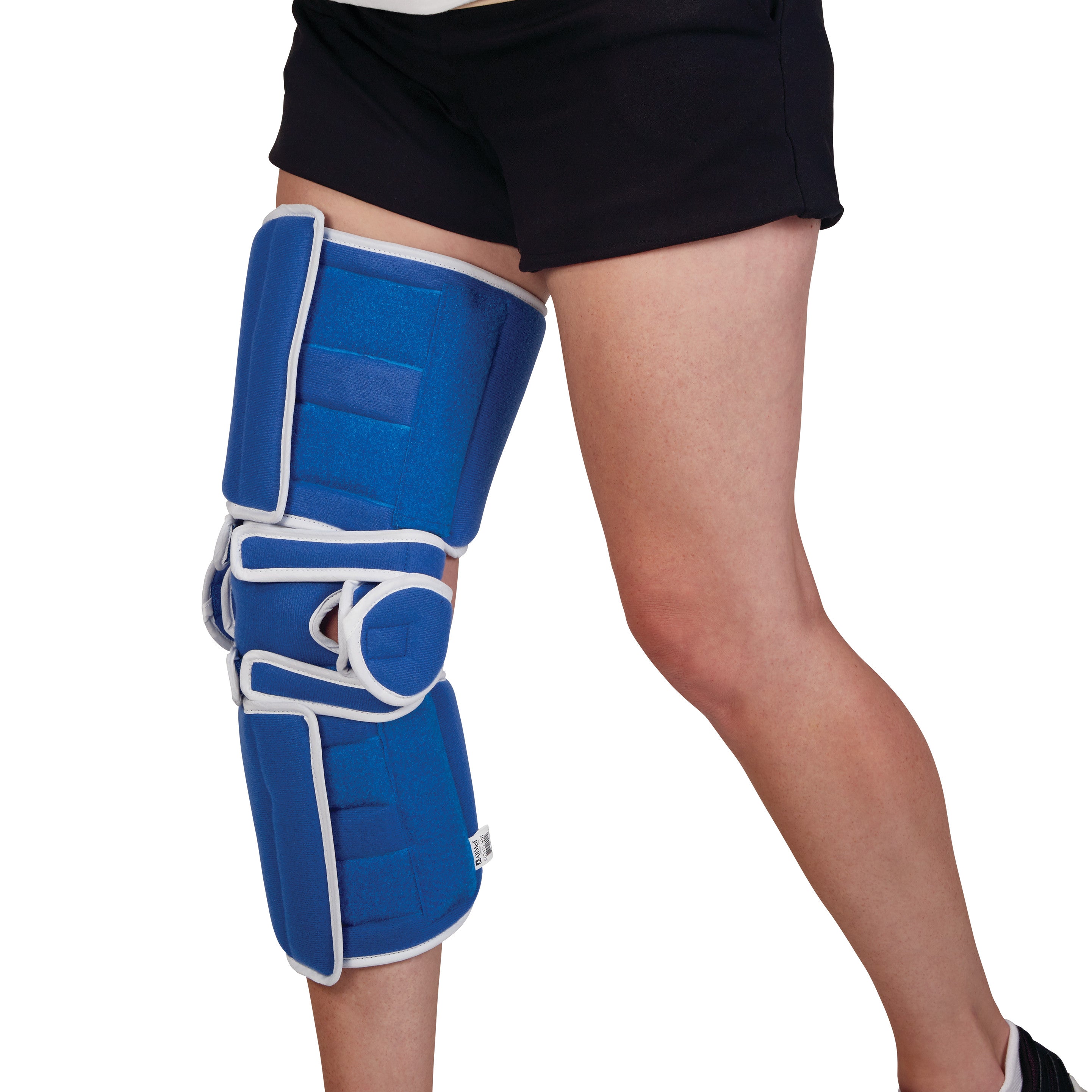 A person wears the AliMed Easy-On Knee Brace. It's blue with white trim, covering from thigh to shin for support.