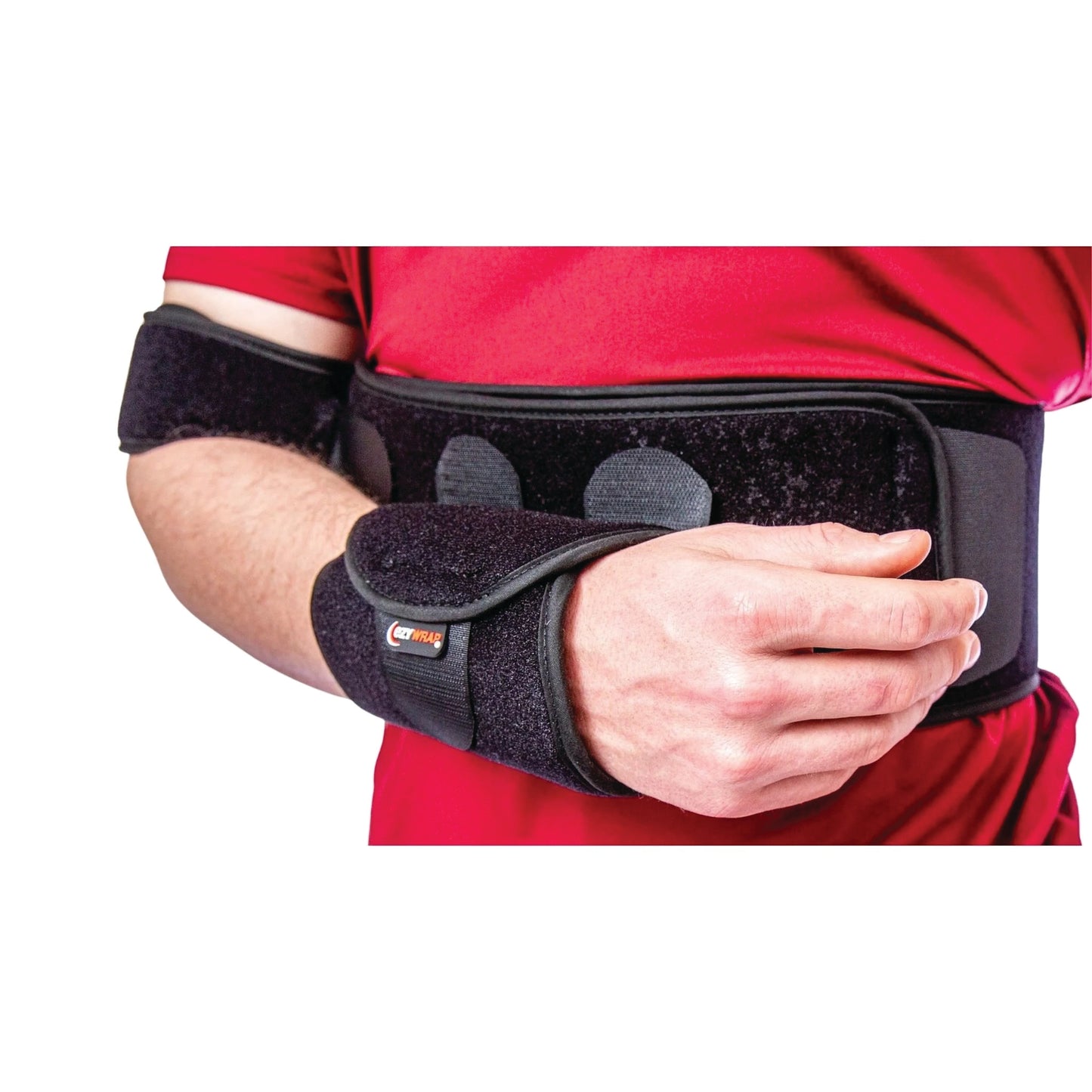 A person wearing an Elastic Torso Belt Shoulder Immobilizer over a red shirt, securing the arm to the body for support.