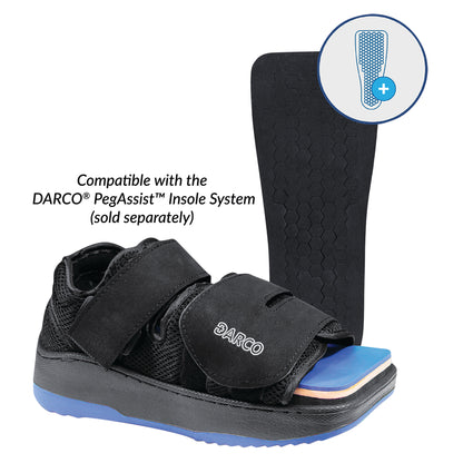 Black DARCO MedSurg DUO medical shoe with straps and a blue sole, shown with a removable black hexagon-patterned insole.