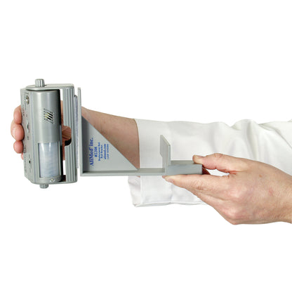A person adjusts an AliMed Magnetic Bed Rail Clamp, holding it horizontally with both hands, showing its attachment mechanism.