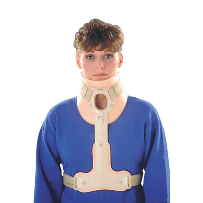 A person wearing a Stabilizer for ssur Philadelphia Tracheotomy Collar, dressed in a blue shirt, facing forward against a white background.
