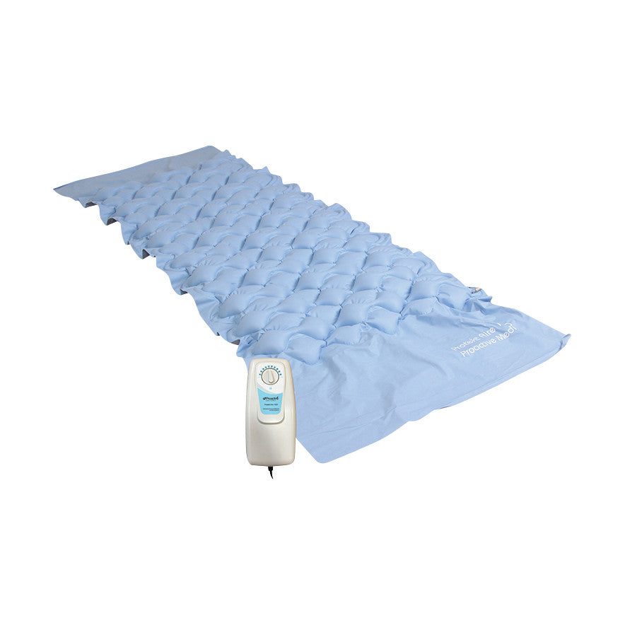 The Protekt Aire Deluxe 1500 Alternating Pressure Overlay System is a light blue inflatable mattress overlay with a control unit attached.