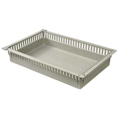 Harloff MedStorMax Modular Exchange Tray, a beige rectangular tray with slotted sides and a flat bottom, is shown in the image.