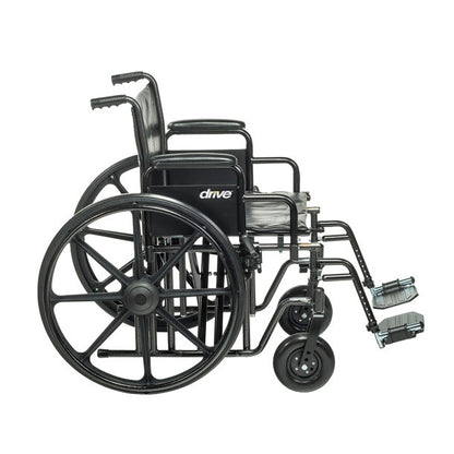 Drive Medical Sentra EC Heavy-Duty Wheelchair with Removable Desk Arms and Swing-Away Footrests, featuring a sturdy black frame.