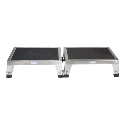 Two connected Blickman EZ Stacking Stools with non-slip surfaces and metal frames, designed for medical or laboratory use.