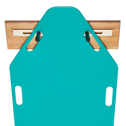The AliMed Shifter Storage Wall Hanger, featuring a teal board with wooden wall mounting and slots for hanging.