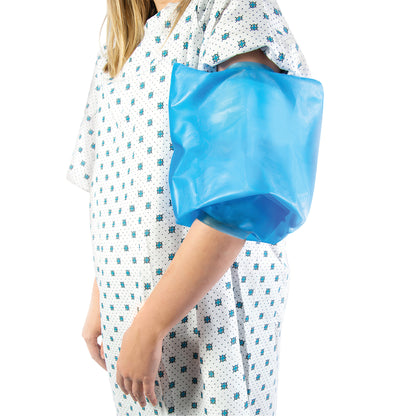 A person wearing a hospital gown uses a Brownmed SEAL-TIGHT Mid-Arm Protector on their arm. The protector is blue and waterproof.
