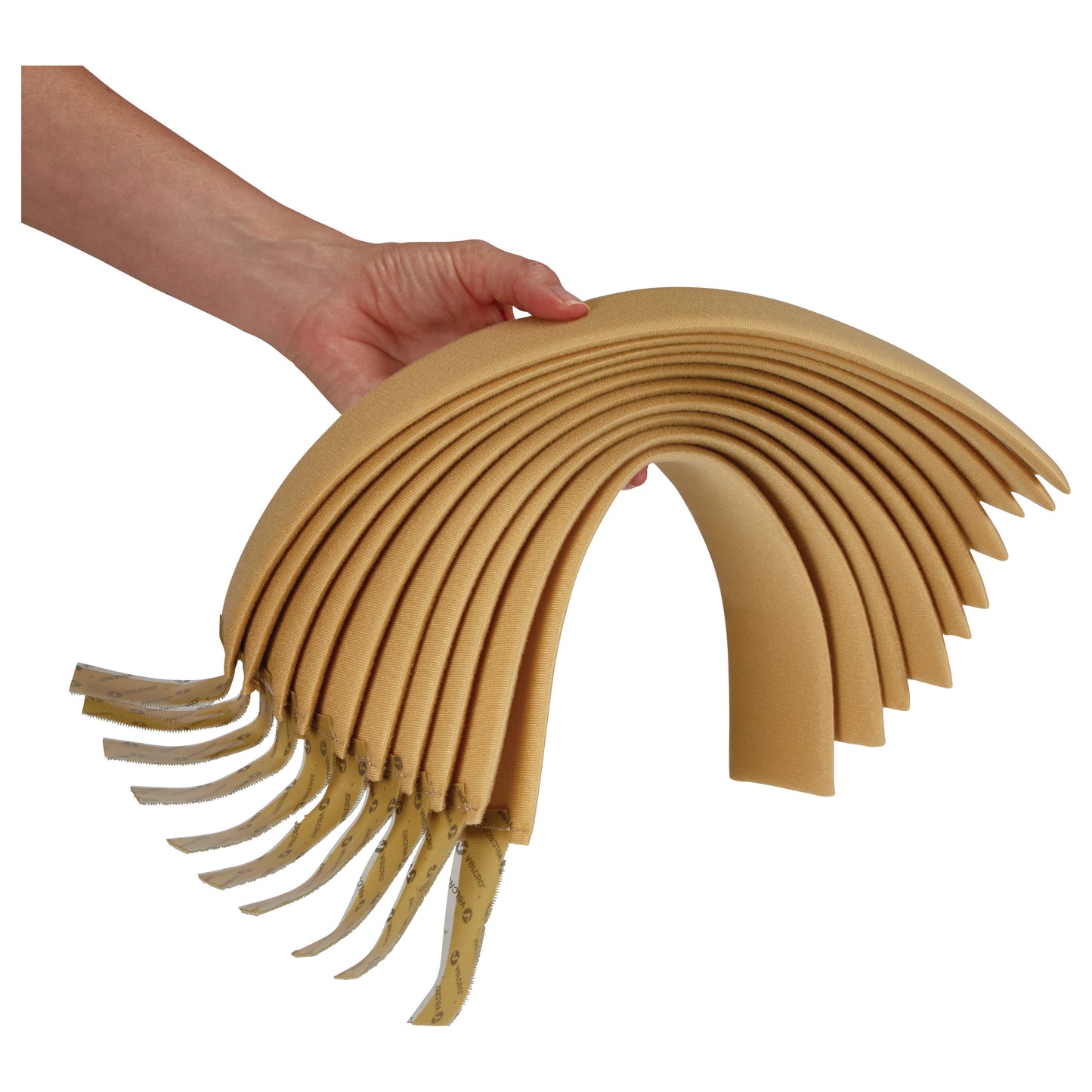 A hand holds multiple AliMed Beta Pile II Self-Adhesive Straps, shown in a curved arrangement.