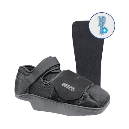 A DARCO HeelWedge Healing Shoe in black with a hexagonal-patterned insole. The shoe has adjustable straps.