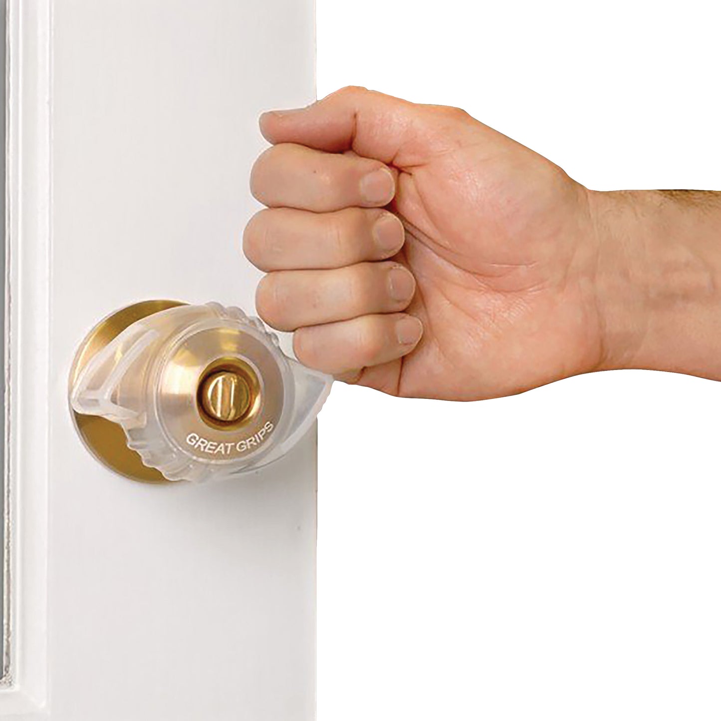 A hand turns a door knob fitted with a clear cover labeled "Great Grips" for improved grip on a brass door knob.