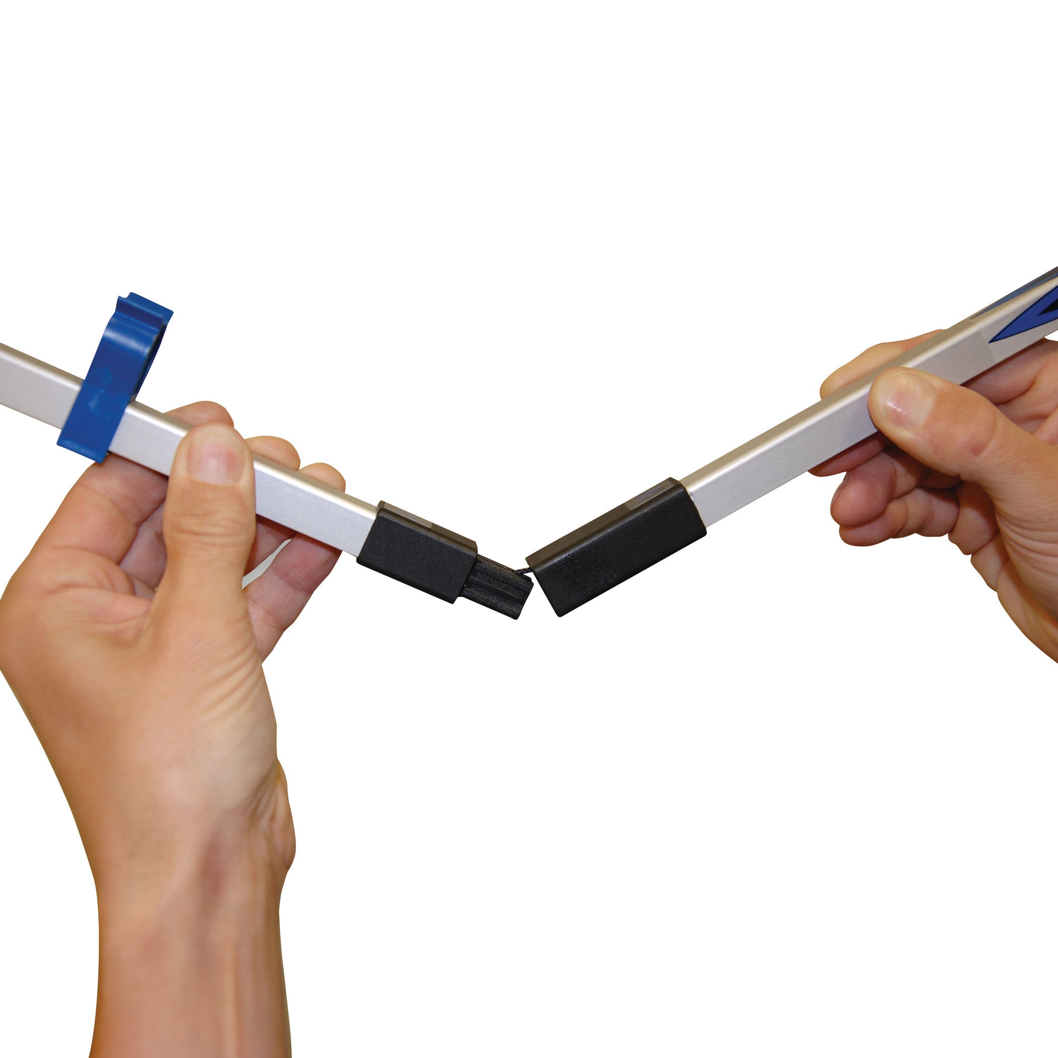 Hands holding the AliMed AliReach Plus Folding Standard Reacher, demonstrating its foldable joint feature.