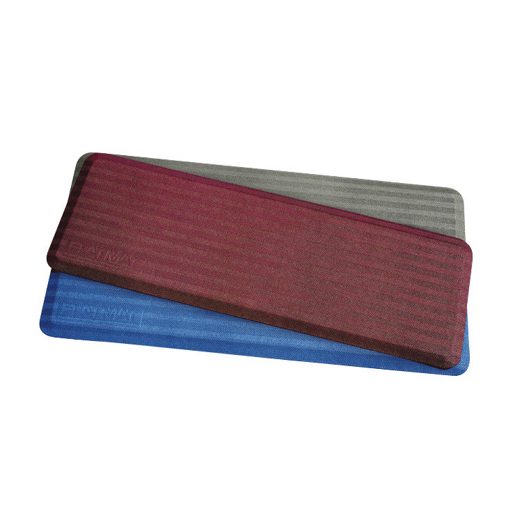 Three FLATMAT Bedside Fall Mats are shown in red, gray, and blue, overlapping each other on a white background.