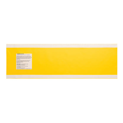 A Flagship Surgical Safe Cord Floor Strip in bright yellow with white edges and a label with instructions.