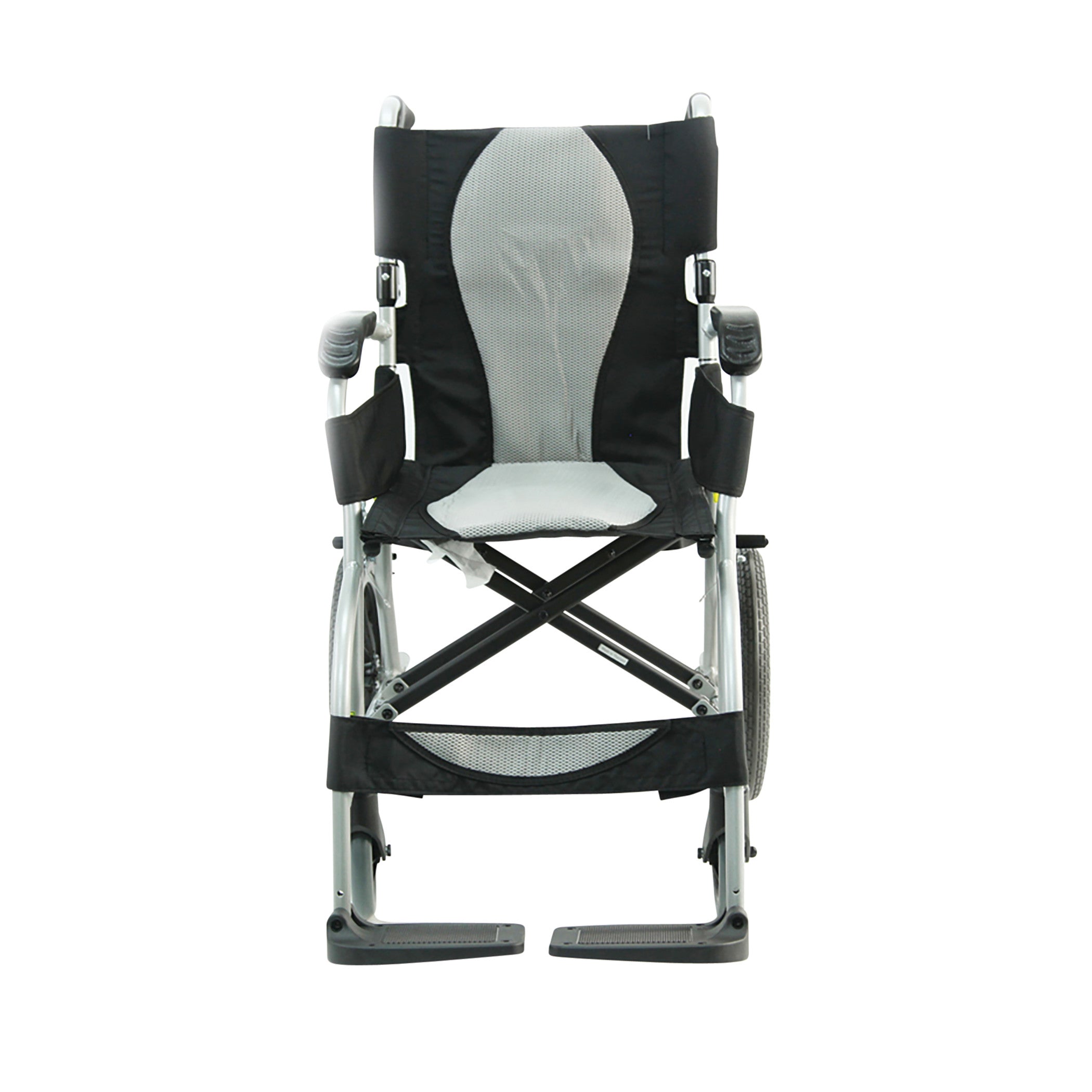 The Karman ERGO-LITE S-2501 Transport Wheelchair is shown from the front, featuring a lightweight frame and foldable footrests.