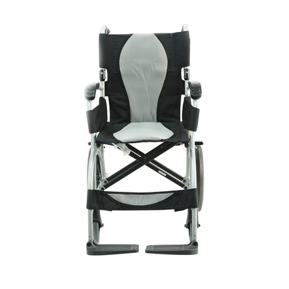 The Karman ERGO-LITE S-2501 Transport Wheelchair is shown from the front, featuring a lightweight frame and foldable footrests.