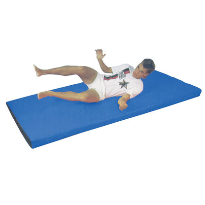 A person is exercising on an AliMed Extra-Thick Exercise Mat, which is blue and rectangular.