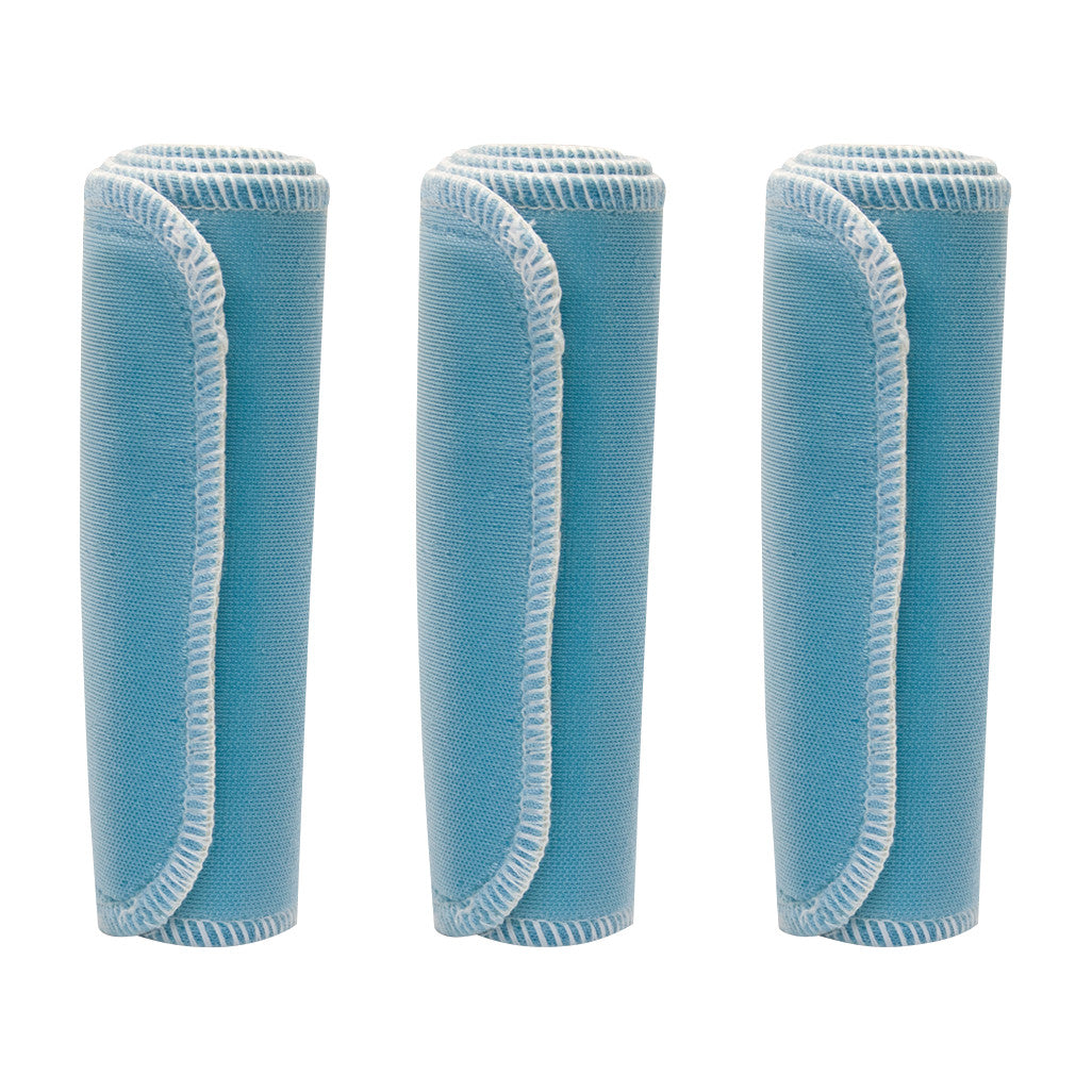 Three rolled blue Chattanooga Nylatex Wraps with stitched edges are standing upright.