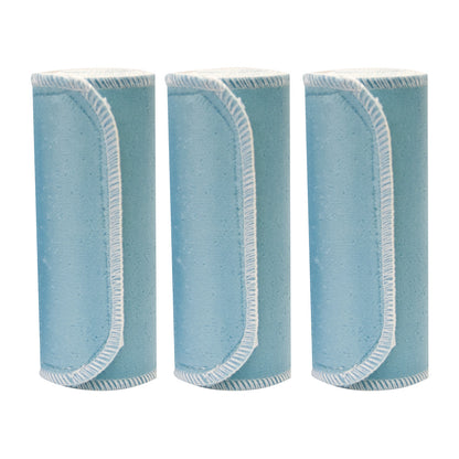 Three Chattanooga Nylatex Wraps, cylindrical and blue, with white stitched edges, are standing upright in a row.