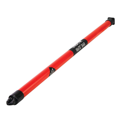 A red CanDo WaTE Bar with black end caps and label, designed for fitness or therapy exercises.