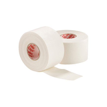 Two rolls of Mueller MTape Athletic Tape in white, with one partially unrolled and the brand name visible inside the roll.