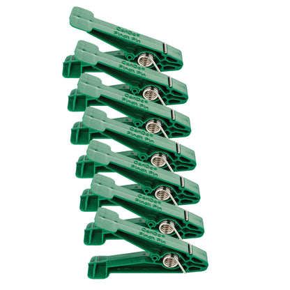 A stack of green clips labeled "Replacement Pin for Finger Pinch Exerciser" with visible metal springs on a white background.