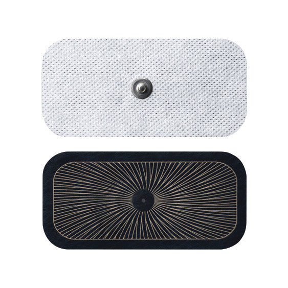 Two UltraStim Snap Electrodes: one white, textured with a metal snap, and one black with a radial pattern and snap in the center.