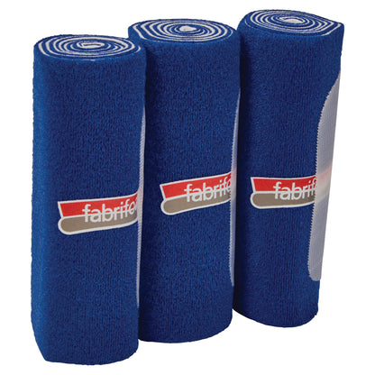 Three rolls of FabriFoam NuStim Wrap in blue, each featuring a logo and tightly coiled design.
