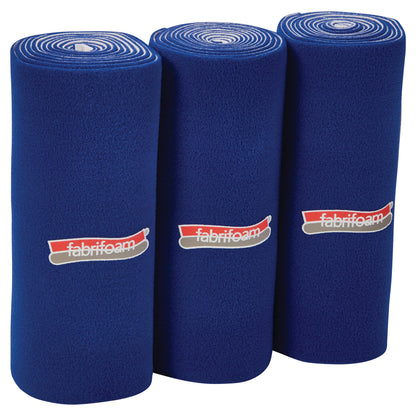 Three rolls of FabriFoam NuStim Wrap in blue, each with a white and red logo, are standing upright in a row.